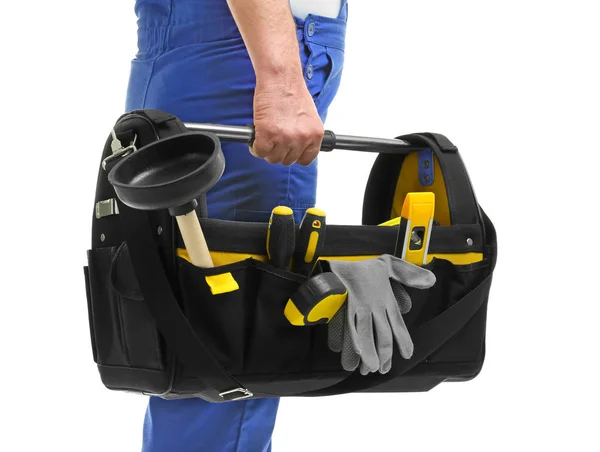 Mature plumber with tool bag on white background — Stock Photo, Image