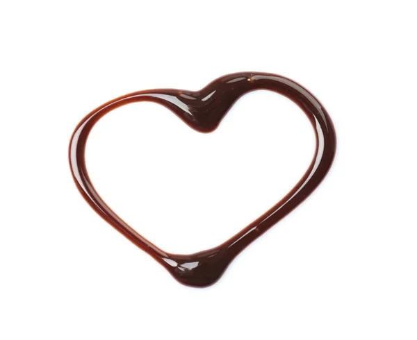 Coração feito de chocolate derretido no fundo branco — Fotografia de Stock