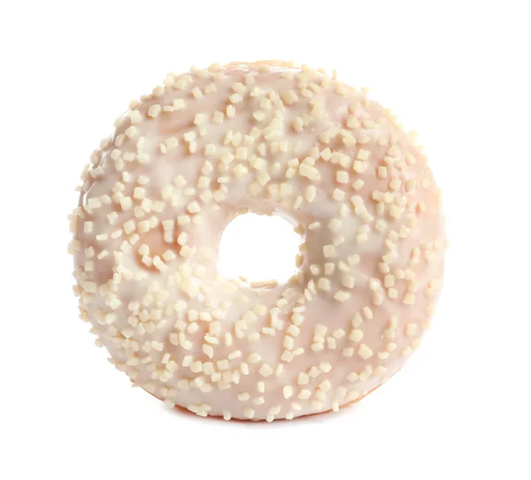 Вкусный пончик с глазурью и брызгами на белом фоне — стоковое фото