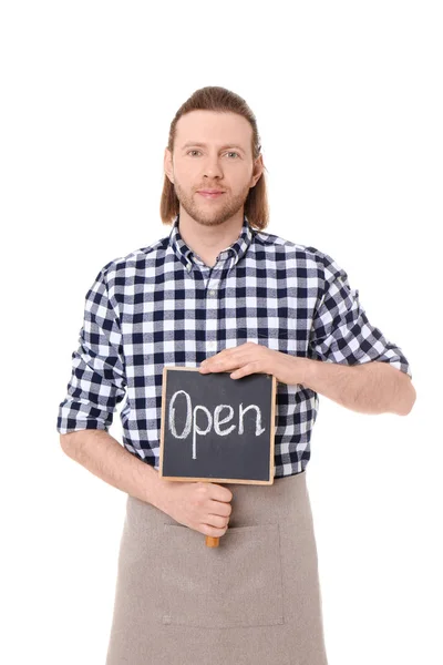 Male florist holding OPEN sign on white background — Stock Photo, Image