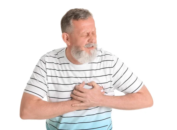 Ώριμος άνδρας έχοντας καρδιακή προσβολή σε λευκό φόντο — Φωτογραφία Αρχείου