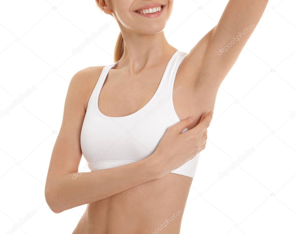 Young woman showing smooth silky skin after epilation on white background
