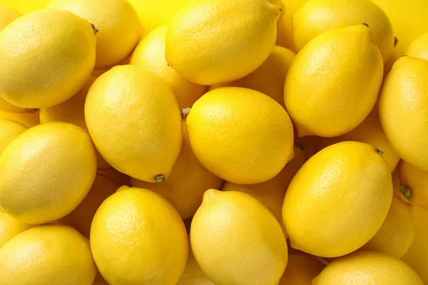 Frutas de limão maduras como fundo, vista superior — Fotografia de Stock