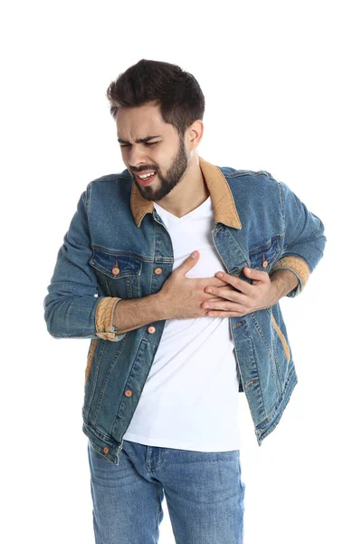 Man suffering from heart pain on white background — Stock Photo, Image