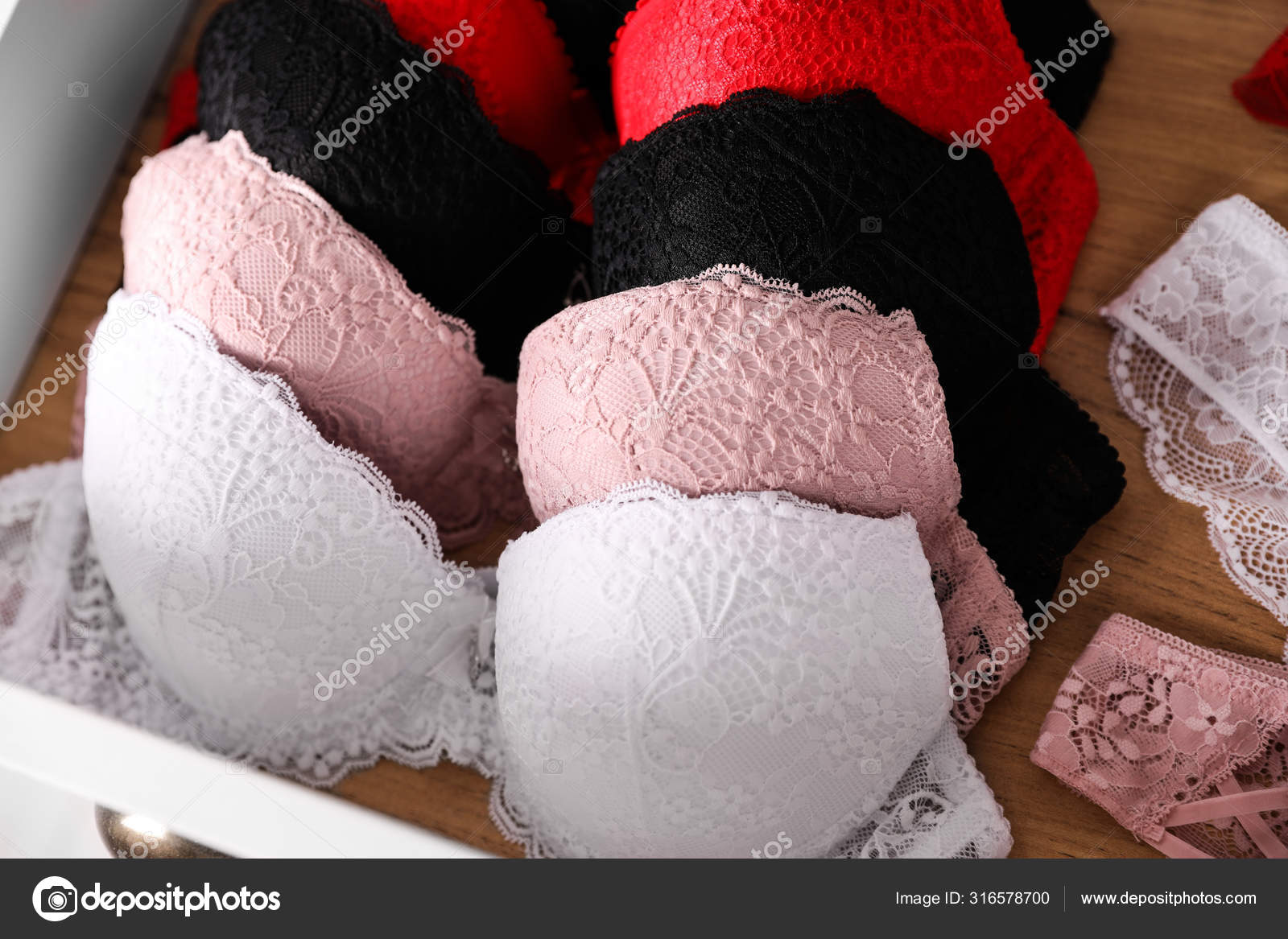 Drawer with beautiful female lace underwear, closeup Stock Photo