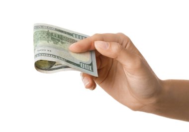 Beyaz arka planda dolar banknotu olan genç bir kadın, yakın plan.
