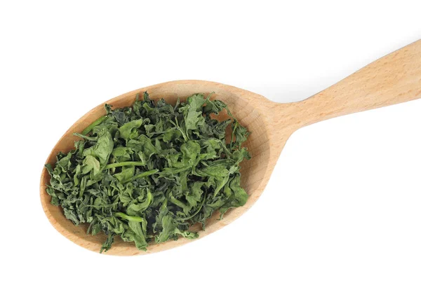 Wooden spoon with dried parsley on white background, top view