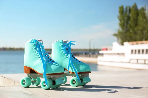 Vintage roller skates outdoors on sunny day