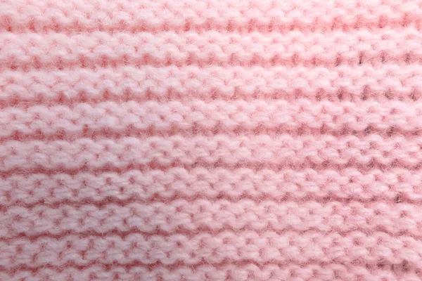 Pink knitted sweater as background, closeup view — Stock Photo, Image