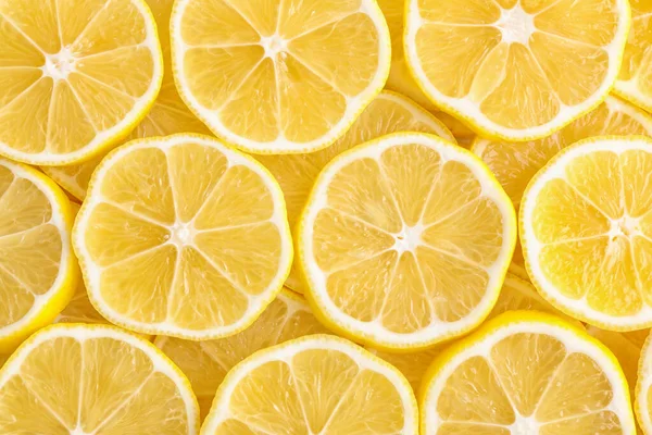 Fatias de limão fresco como fundo, vista superior — Fotografia de Stock