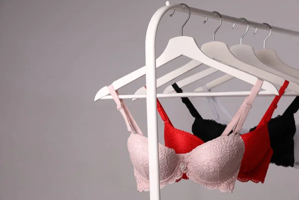 Woman taking bra out of drawer, closeup. Stylish underwear Stock