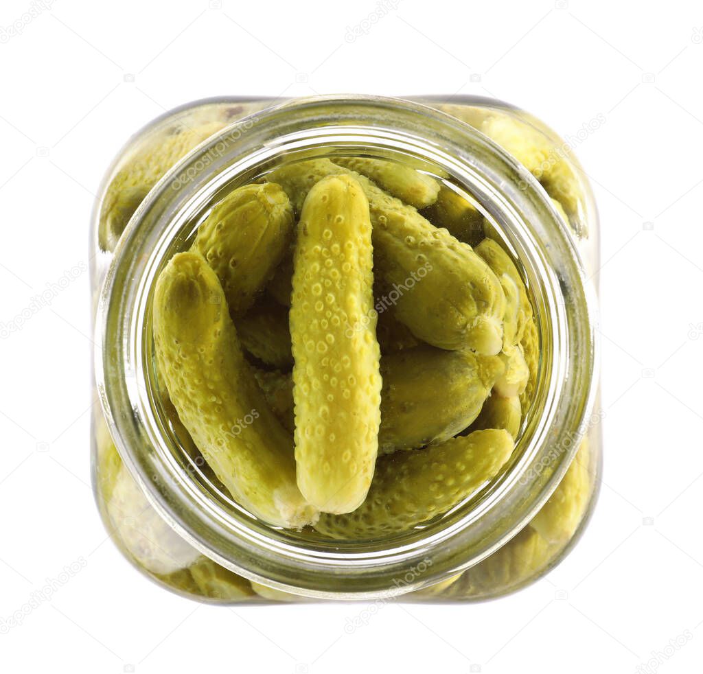 Open jar with pickled gherkins on white background, top view