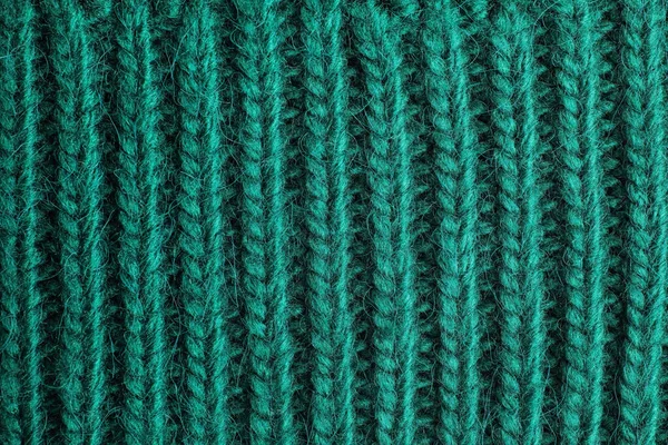 Green knitted sweater as background, closeup view — Stock Photo, Image