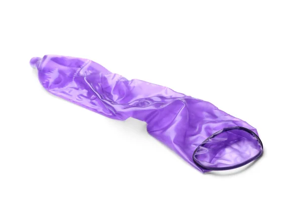 Purple used condom on white background. Safe sex concept — ストック写真