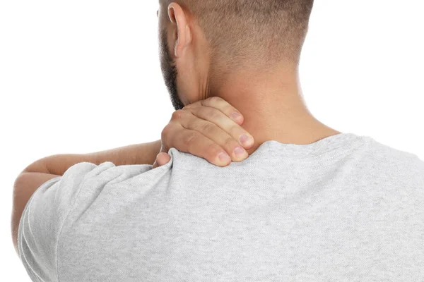 Homme souffrant de douleurs au cou sur fond blanc, gros plan — Photo