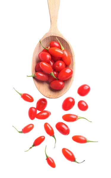 Fresh ripe goji berries and spoon on white background, top view — Stock Photo, Image
