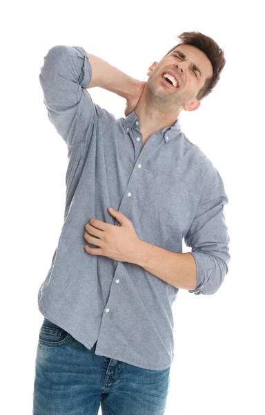 Hombre que sufre de dolor de cuello sobre fondo blanco — Foto de Stock