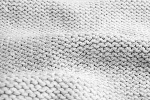 Szürke kötött pulóver, mint a háttér, közelkép — Stock Fotó