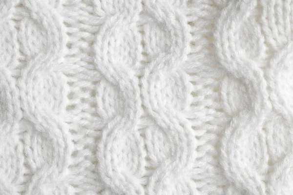 Witte gebreide trui als achtergrond, close-up view — Stockfoto