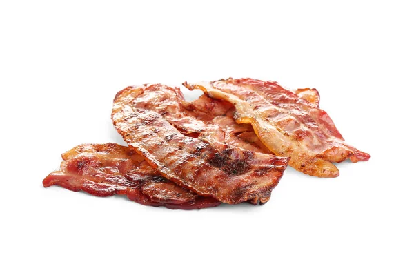 Skivor av välsmakande stekt bacon på vit bakgrund — Stockfoto