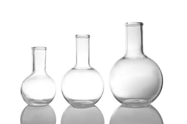 Empty Florence flasks on white background. Laboratory glassware — Stock Photo, Image