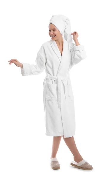 Young woman in bathrobe on white background — Stock Photo, Image