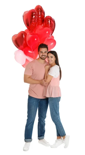 Jovem Casal Feliz Com Balões Forma Coração Isolado Branco Celebração — Fotografia de Stock