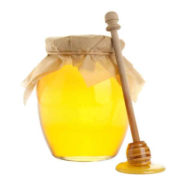 Γυάλινο βάζο με μέλι ακακίας και ξύλινη κουτάλα που απομονώνεται σε λευκό — Φωτογραφία Αρχείου