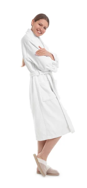 Young woman in bathrobe on white background — Stock Photo, Image