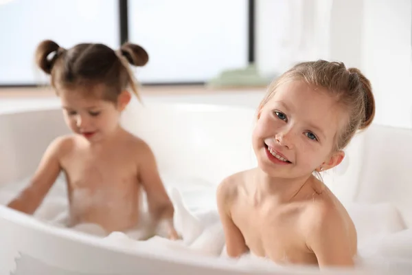 Cute Little Sisters Taking Bubble Bath Together — Stock Photo, Image