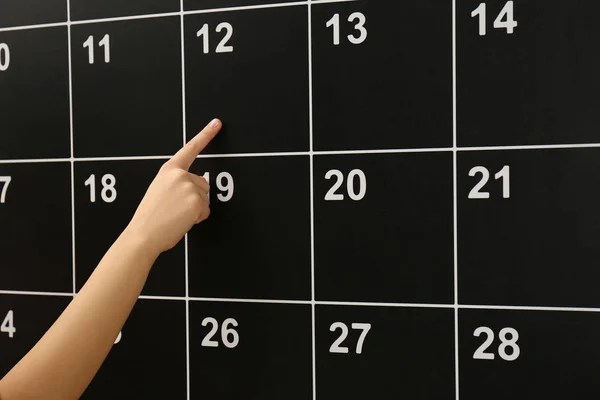 Woman Pointing Date Board Calendar Closeup — Stock Photo, Image