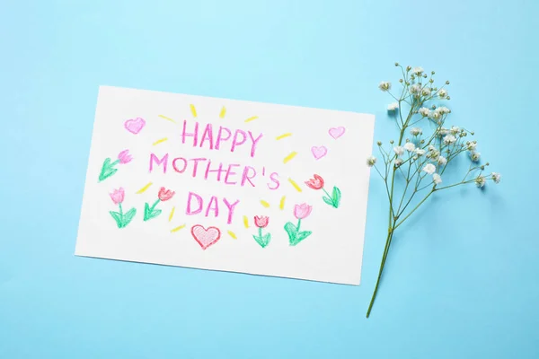 Handmade greeting card for Mother's day and flower on light blue — Stock Photo, Image