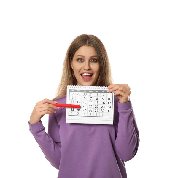 Молодая Женщина Проводит Календарь Отмеченными Днями Менструального Цикла Белом Фоне — стоковое фото