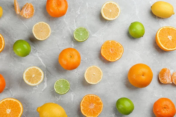 Flat Lay Composition Tangerines Different Citrus Fruits Grey Marble Background — Stock Photo, Image