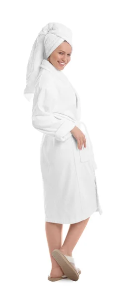 Young woman in bathrobe on white background — Stock Photo, Image