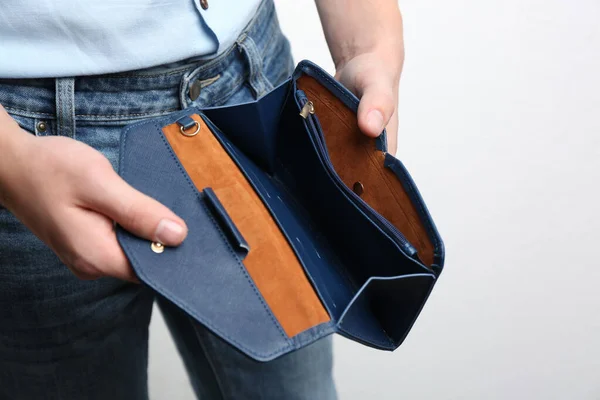 Man Showing Empty Wallet Light Background Closeup — Stock Photo, Image