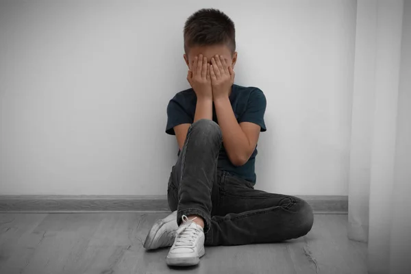 Sad Little Boy Closing Eyes Hands Floor Indoors Child Danger — Stock Photo, Image