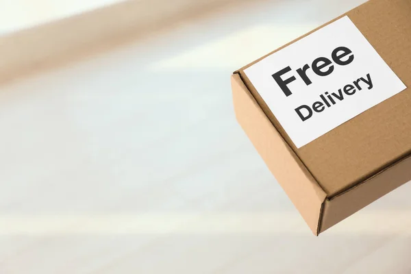 Parcel Sticker Free Delivery Indoors Space Text Courier Service — Stock Photo, Image