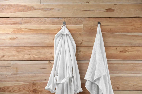 Soft Comfortable Bathrobe Towel Hanging Wooden Wall — Stock Photo, Image