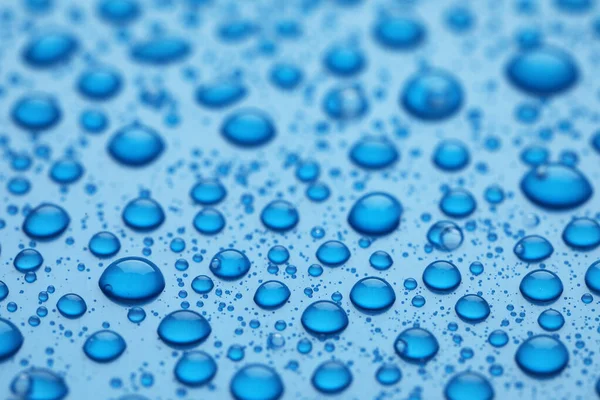 Krople Wody Niebieskim Tle Widok Bliska — Zdjęcie stockowe