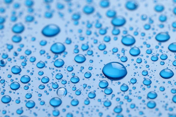 Вода Падає Синій Фон Вид Крупним Планом — стокове фото