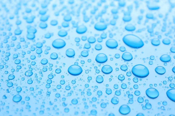 Waterdruppels Lichtblauwe Achtergrond Close Upzicht — Stockfoto