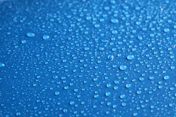 Vatten Droppar Blå Bakgrund Närbild — Stockfoto
