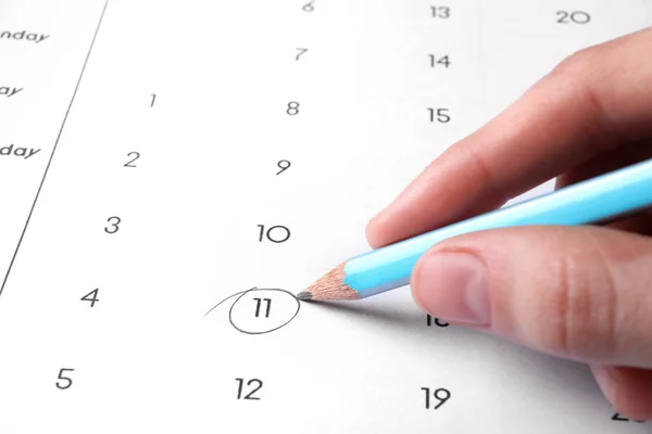 Woman Marking Date Calendar Pencil Closeup — Stock Photo, Image