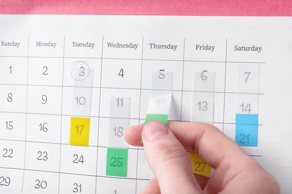 Woman Marking Date Calendar Sticker Closeup — Stock Photo, Image