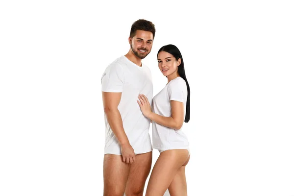 Pareja Joven Camisetas Blancas Ropa Interior Sobre Fondo Claro — Foto de Stock