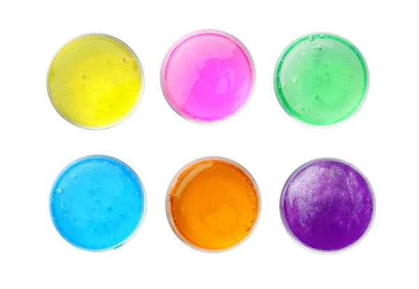 Kolorowe Szlamy Plastikowych Pojemnikach Białym Tle Widok Góry Zabawka Antystresowa — Zdjęcie stockowe