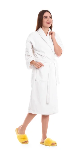 Jovem mulher em roupão de banho no fundo branco — Fotografia de Stock