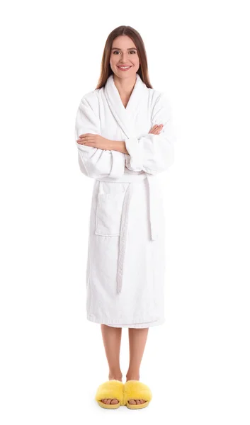 Jovem mulher em roupão de banho no fundo branco — Fotografia de Stock