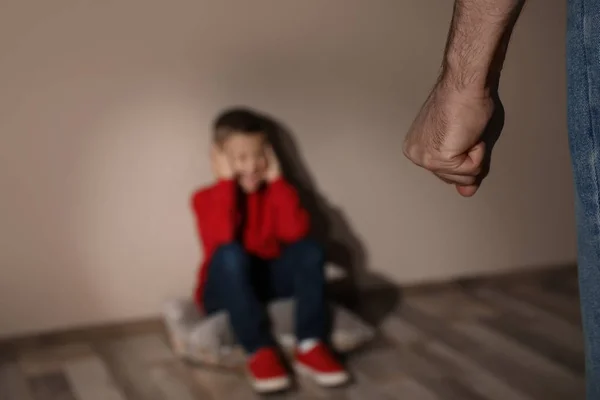 Man threatening his son indoors, closeup. Domestic violence conc — Stock Photo, Image